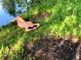 Russian milf swallows a huge load of piss in the outdoors