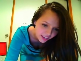 Sexy busty brunette masturbating on webcam