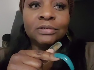 sexy black lady with awesome long nails fingernails