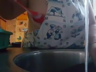 Horny doing the dishes