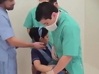 Two doctors take turns fucking a hot Spanish nurse